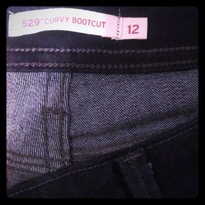 Women’s jeans 👖 boot cut medium length dark blue.